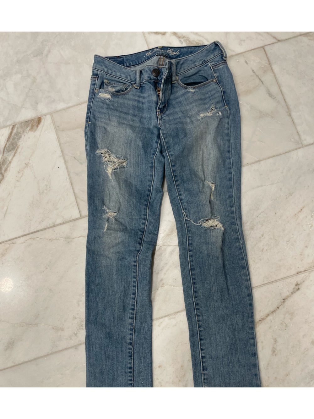 American Eagle Skinny jeans distressed and glitter, Size 2.